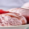 Scrumptious-Strawberry-ree-Ice-Cream-A-Burst-of-Juicy-goodness-featured-image-200x600w-scoops-of-strawberry-ice-cream-in-blue-and-white-dish-with-fresh-strawberries-frosted-fusions