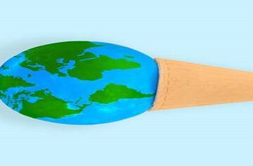 Which-country-invented-ice-cream-featured-image-200x600w-blue-and-green-globe-in-an-ice-cream-cone-sideways-light-blue-background-frosted-fusions