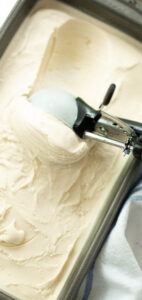 Ice Cream Flavours to make your taste buds tingle! image 4 jpeg Tray of vanilla ice cream being scooped frosted fusions