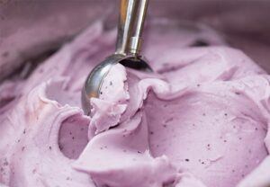 National-Ice-Cream-Day-A-Day-of-Frozen-Delights-image 3 lilac coloured ice cream + silver scoop frosted fusions