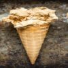 Salivate-Over-the-Irresistible-Charm-of-Salted-Caramel-Ice-Cream-featured-image-200x600w-three-salted-caramel-cones-lined-up-dark-background-frosted-fusions