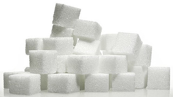 Diabetes and Ice Cream Making Healthier Choices image 2 jpeg stack of sugar cubes white background frosted fusions