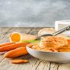 Getting-to-the-Root-of-it-A-Carrot-Sorbet-Sensation-featured-image-200x600w-carrot-sorbet-with-cones-and-raw-carrots-scattered-frosted-fusions