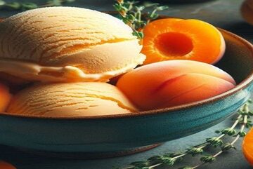 Homemade-Apricot-and-Thyme-Ice-Cream-Recipe-updated-feb25-featured-image-637x1920w-bowl-of-apricot-ice-cream-with-fresh-apricots-and-thyme-Frosted-Fusions