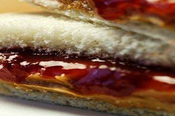 Homemade-Peanut-Butter-and-Jelly-Ice-Cream-A-Nutty-Fruity-Delight-featured-image-202x630w-peanut-butter-and-jelly-sandwich-frosted-fusions