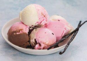 Neopolitan-Ice-Cream-A-Classic-Trio-of-Flavours-image-10-bowl-of-neapolitan-ice-cream-with-vanilla-pods-on-the-side-frosted-fusions