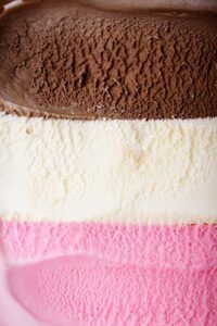 Neopolitan-Ice-Cream-A-Classic-Trio-of-Flavours-image-4-neopolitan-ice-cream-strawberry-vanilla-and-chocolate-rotated-frosted-fusions