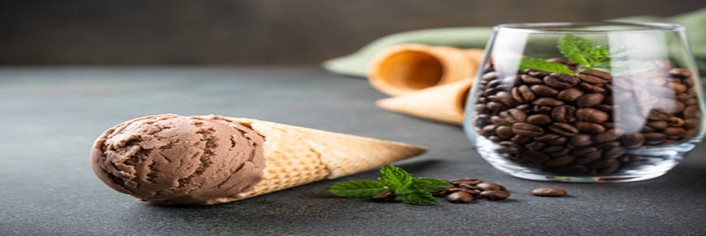 The-Perfect-Brew-Homemade-Coffee-Ice-Cream-featured-image-200x598w-coffee-ice-cream-in-a-cone-plus-glass-filled-with-coffee-beans-and-some-fresh-leaves-frosted-fusions