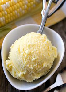 A Cornucopia of Flavours Homemade Sweet Corn Ice Cream image 4 Sweet corn ice cream in white heart dish with corn kernals scattered frosted fusions