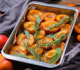 Deliciously Refreshing Homemade Apricot and Thyme Ice Cream Recipe image 6 tray of roasted apricots with rosemary frosted fusions