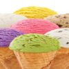 The-Scoop-on-Artisan-Ice-Cream-featured-image-200x600w-several-scoops-of-different-coloured-ice-cream-in-cones-white-background-frosted-fusions