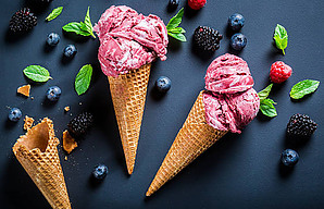 A Refreshing and Healthful Homemade Blueberry Sorbet image 6 waffle cones with berrie sorbet and a selection of fresh berries frosted fusions