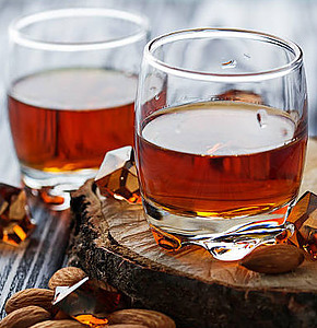 homemade-cherry-amaretto-ice-cream-image-3-two-glasses-of-amaretto-with-almonds-scattered-frosted-fusions
