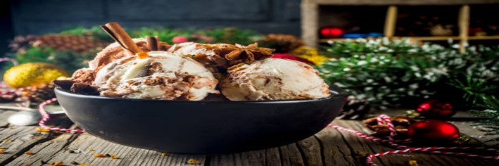 Festive-Homemade-Ice-Cream-Flavours-for-a-Cosy-and-Delicious-Christmas-featured-image-200x600w-gingerbread-ice-cream-with-cinnamon-star-anise-with-xmas-balls-and-tinsel-frosted-fusions