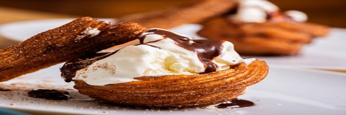 Homemade-Cinnamon-Churros-Ice-Cream-Spice-and-Crispy-Comfort-featured-image-200x600w-Churros-and-scoop-of-ice-cream-with-chocolate-sauce-frosted-fusions