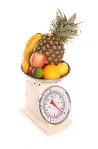 How-To-Make-The-Perfect-Smoothie-image-15-weighing-scales-with-a-selection-of-fresh-fruits-frosted-fusions