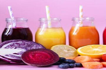New-Year-Fresh-Vibes-Nourish-Your-Body-With-Healthful-Smoothies-featured-image 200x600w 5 smoothies-lined-up in glass jars straws different-colours-with-fresh-fruit and lilac background-frosted fusions