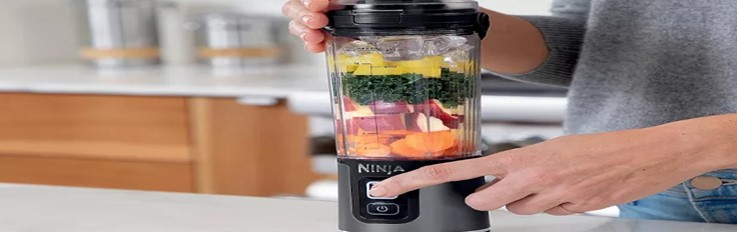The-Ninja-Blast-Portable-Blender-A-Detailed-Review-featured-image-818x2600w-ninja-blast-portable-blender-loaded-with-ingredients-ready-to-be-blended-frosted-fusions