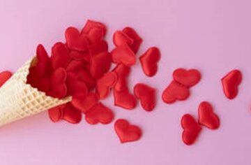 Homemade-Ice-Cream-Treats-For-Valentines-Day-featured-image-200x620w-red-hearts-spilling-from-an-ice-cream-cone-frosted-fusions