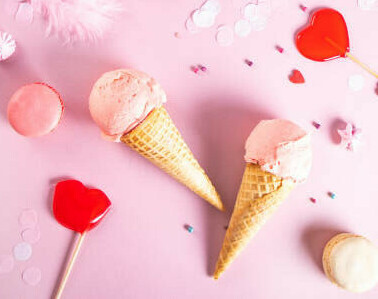Homemade Ice Cream Treats For Valentines Day featured image ice creams in cones hearts sprinkles and wrapped present frosted fusions