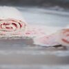 From-Scoop-To-Roll-Learn-To-Create-Your-Own-Homemade-Ice-Cream-Rolls-featured-image-200x650w-three-ice-cream-rolls-being-made-on-frozen-plate-with-spatula-rolling-one-frosted-fusions