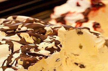Indulge-Your-Senses-With-A-Decadent-Tiramisu-Ice-Cream-Recipe-featured-image-200x630w-tray-of-tiramisu-ice-cream-with-a-tiramisu-label-cropped-frosted-fusions