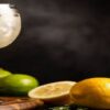 Homemade-Gin-And-Tonic-Ice-Cream-Recipe-The-Perfect-Summer-Treat-featured-image-200x620w-glass-of-gin-and-toni-with-lemons-and-limes-slices-frosted-fusions