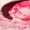 Homemade-Raspberry-Ripple-Ice-Cream-A-Deliciously-Fruity-Treat-featured-image-200x620w-scoop-of-raspberry-ripple-ice-cream-with-ice-cream-scoop-frosted-fusions