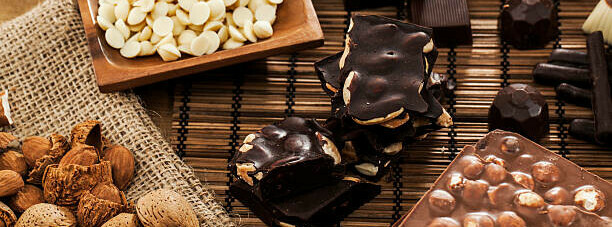 A Deliciously Easy Homemade Butterscotch Ice Cream image 1 selection of nuts and chocolate for mixins frosted fusions