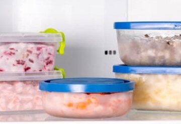 Ice-Cream-Storage-Solutions-–-Essential-Tips-To-Keep-Your-Homemade-Ice-Cream-Fresh-featured-image-210x620w-ice-cream-containers-stacked-in-a-freeezer-frosted-fusions