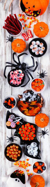 halloween-ice-cream-treats-spooky-ice-scream-recipes-for-the-occasion-image-6-selection-of-halloween-sweets-and-toppings-for-desserts-frosted-fusions