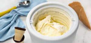 how-to-make-homemade-ice-cream-soft-fluffy-and-scoopable-image-2-soft-churned-ice-cream-in-churner-bowl-frosted-fusions