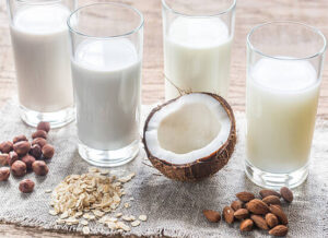 how-to-make-homemade-ice-cream-soft-fluffy-and-scoopable-image-5-glasses-oif-almond-coconut-oat-and-hazelnut-milk-with-each-fresh-component-frosted-fusions