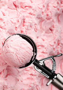 how-to-make-homemade-ice-cream-soft-fluffy-and-scoopable-image-8-pink-strawberry-ice-cream-with-silver-ice-cream-scoop-frosted-fusions