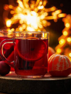 churn-baby-churn-homemade-ice-cream-recipes-to-remember-remember-image-4-glasses-of-mulled-wine-cinnamon-sticks-and-fireworks-in-the-background-frosted-fusions