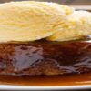 How-To-Pair-Ice-Cream-With-Classic-Christmas-Desserts-featured-image-280x1000w-sticky-toffee-pudding-with-caramel-sauce-and-a-scoop-of-vanilla-ice-cream-frosted-fusions