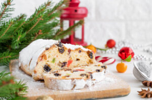 Stollen-Cake-Ice-Cream-Recipe-A-Taste-Of-Germany-update-Feb25-image-1-stollen-cake-sliced-with-festive-decor-frosted-fusions