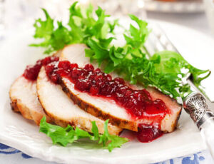 boxing-day-leftovers-turn-christmas-flavours-into-ice-cream-treats-image-3-slices-of-turkey-with-cranberry-sauce-spread-all-over-it-frosted-fusions