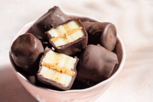Fun-Easy-And-Healthy-Frozen-Dessert-Recipe-Ideas-For-Kids-image-3-chocolate-covered-banana-and-peanut-butter-ice-cream-frozen-bites-frosted-fusions