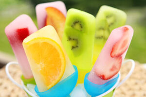 Fun-Easy-And-Healthy-Frozen-Dessert-Recipe-Ideas-For-Kids-image-6-selection-of-fruit-sorbet-lollies-with-different-coloirs-and-fruits-frosted-fusions