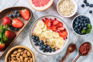 Quick-EasyAnd-Deliciously-Healthy-Breakfast-Smoothie-Recipes-image-1-top-view-of-breakfast-smoothie-with-additional-ingredients-to-the-side-Frosted-Fusions