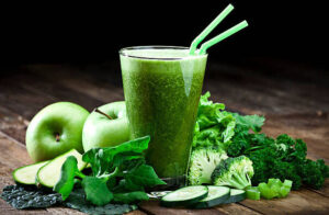 which-smoothie-style-suits-you-best-image-1-glass-of-green-smoothie-with-all-related-ingredients-frosted-fusions