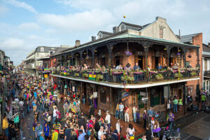 5-Creole-Cajun-Inspired-Ice-Cream-Recipes-To-Jazz-Up-Your-Mardi-Gras-image-10-street-view-in-new-orlkeans-of-mardi-gras-carnival-Frosted-fusions