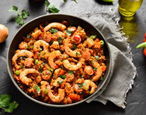 5-Creole-Cajun-Inspired-Ice-Cream-Recipes-To-Jazz-Up-Your-Mardi-Gras-image-12-new-orleans-jambalaya-with-prawns-in-skillet-Frosted-Fusions