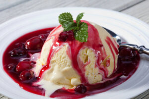 Love-At-First-Scoop-–-Valentines-Ice-Cream-Recipe-Ideas-image-5 cherry and almonf amaretto ice cream with cherry coulis drizzled over the top Frosted-Fusions