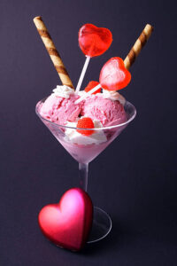 Love-At-First-Scoop-–-Valentines-Ice-Cream-Recipe-Ideas-image-7-tall-glass-with-ice-cream-sundae-and-love-hearts-Frosted-Fusions