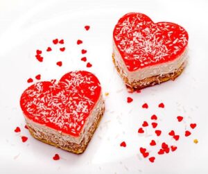 Valentines-Day-Ice-Cream-Dessert-Charcuterie-Board-Ideas-image-7-ice-cream-cream-sandwiches-shaped-as-hearts-Frosted-Fusions