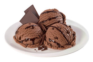 Classic-Fudge-Meets-Chocolate-Fudge-Ice-Cream-–-Trendy-Nostalgia-image-5 chocolate-fudge-ice-cream-and-chocolate-pieces white background-Frosted-Fusions
