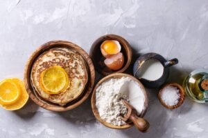 Holy-Crepe-Homemade-Pancake-Ice-Cream-image-5-top-view-of-pancake-ingredients-and-a-plate-of-pancakes-Frosted-Fusions