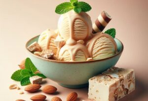 Homemade Nougat Ice Cream – A Classic British Treat Reimagined image 4 bowl of nougat ice cream with pieces of nougat and almonds to the side Frosted Fusions